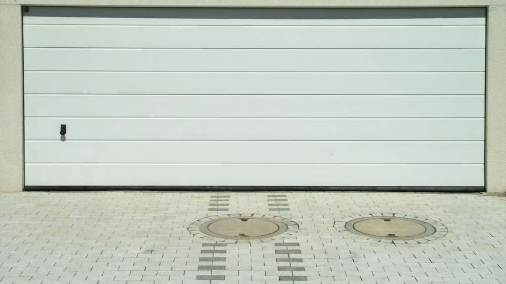 Des raisons de choisir une porte de garage sectionnelle 1 Des raisons de choisir une porte de garage sectionnelle 1